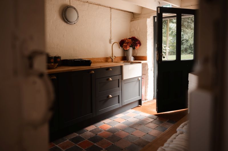 the bell tower suite, boot room kitchen at solton manor, near dover, kent, england