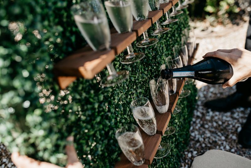 A champagne wall set up in the quintessentially English Gardens at Solton Manor, Kent, England